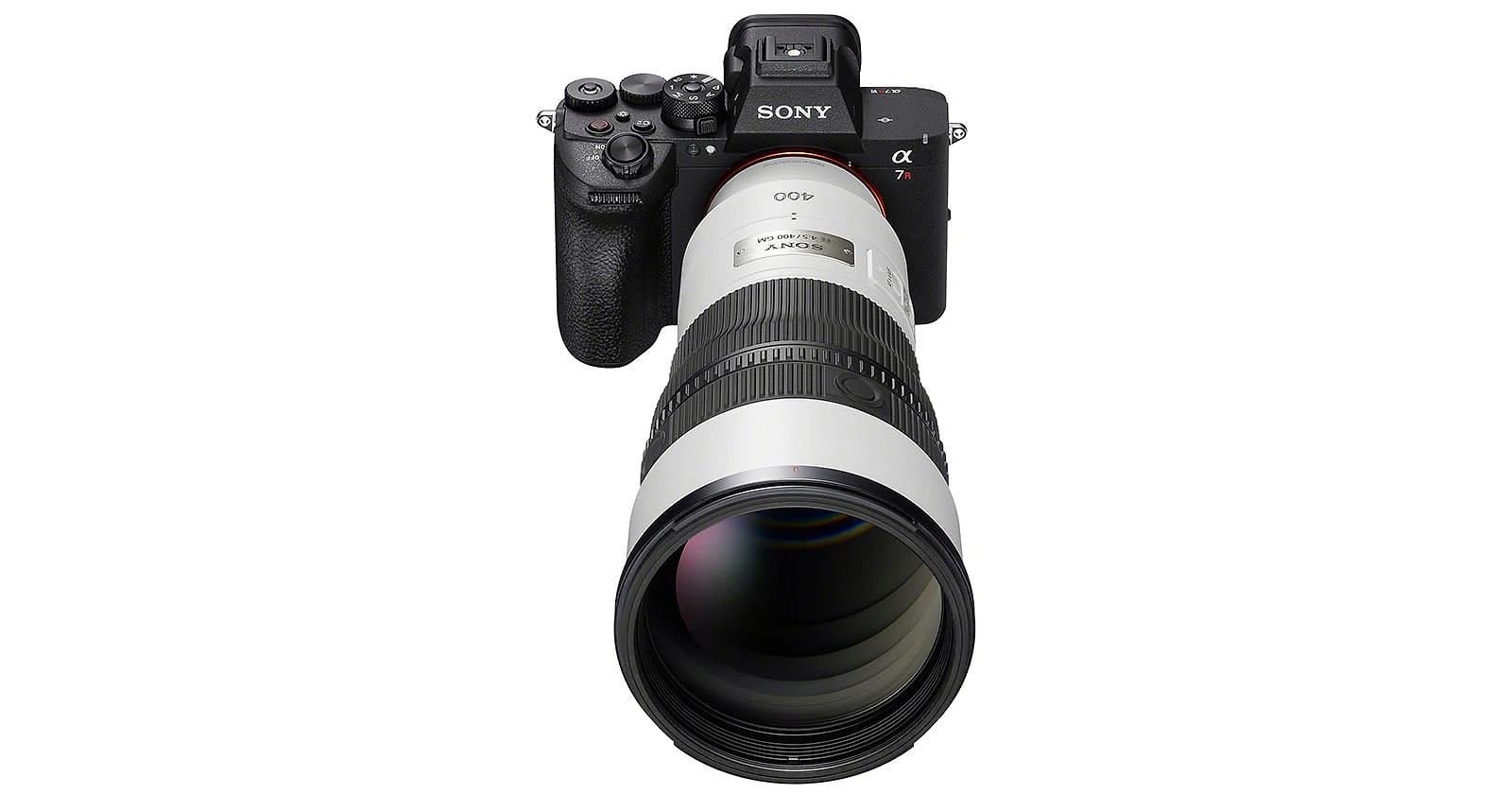 A Sony Alpha 7R V camera body attached to a large white telephoto lens, viewed from a high angle against a white background.