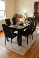 Black high-gloss dining set with 4 or 6 seat options.png