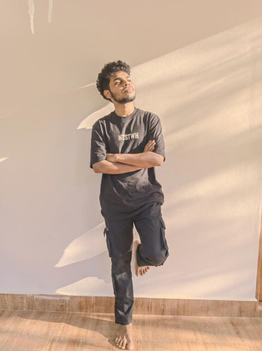 Man leaning against wall 2K 202609062322.jpg