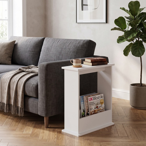 Paired as nightstands, two slim side table units flank a double bed.jpg