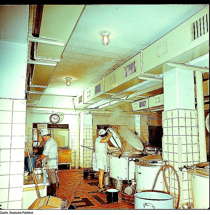Sharp closing photo of organized commercial refrigeration and prep stations
