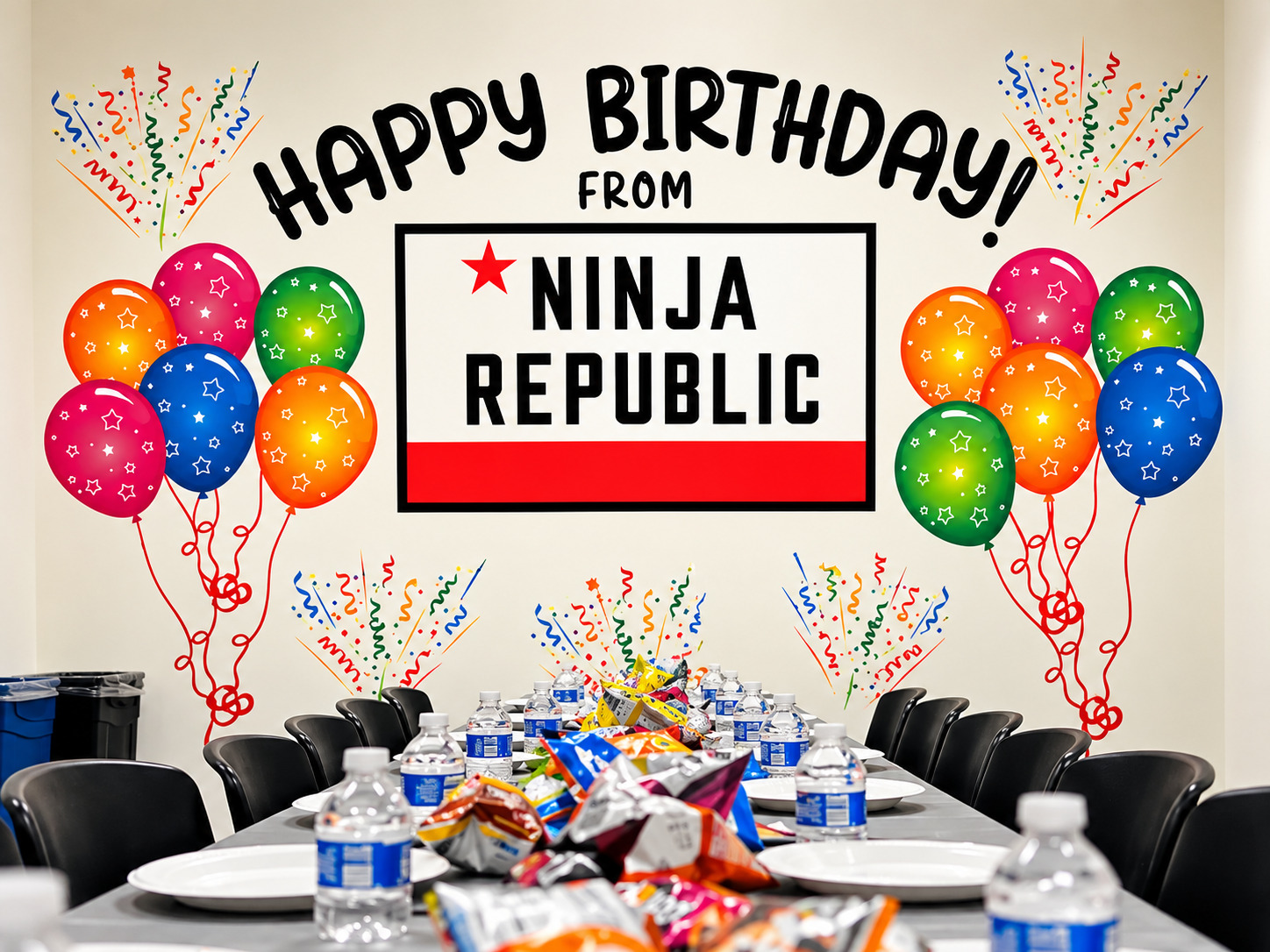 Ninja Republic party room with a Happy Birthday wall and a table set for guests