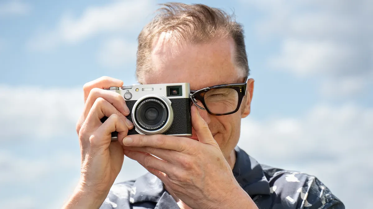 Niall Hampton holding Fujifilm X100VI