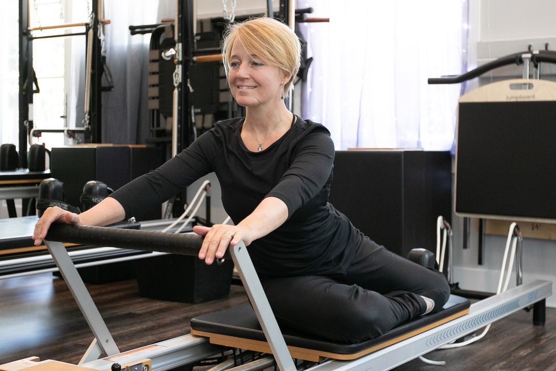 Pilates Reformer training in a boutique Bluffton studio with personalized instruction