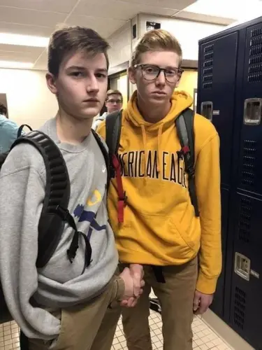 psbattle these two friends shaking hands through their v0 o5m20cv34aa21.webp