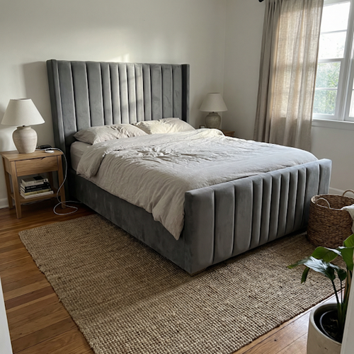 Double ottoman bed frame with winged design.png