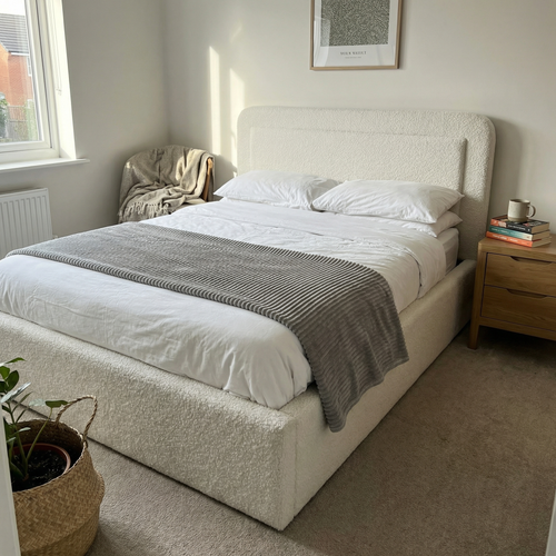 This beige ottoman bed is great for our spare room.png