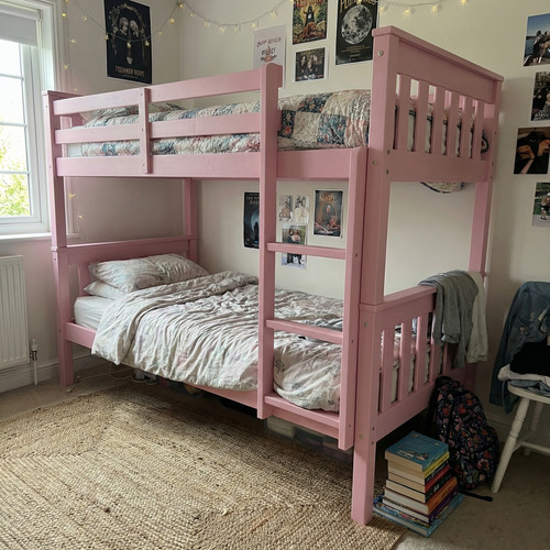 Using a Pink double and single bunk bed to Save Space.jpg