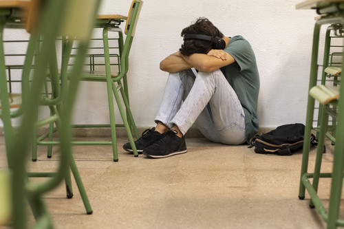 full shot sad teenager school.1