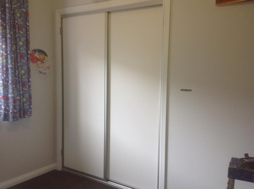Built-In Sliding Door Wardrobes for Seamless Living.jpg