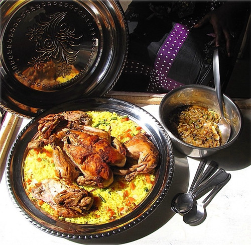 Poulet Yassa Chicken rice with onion sauce.jpg