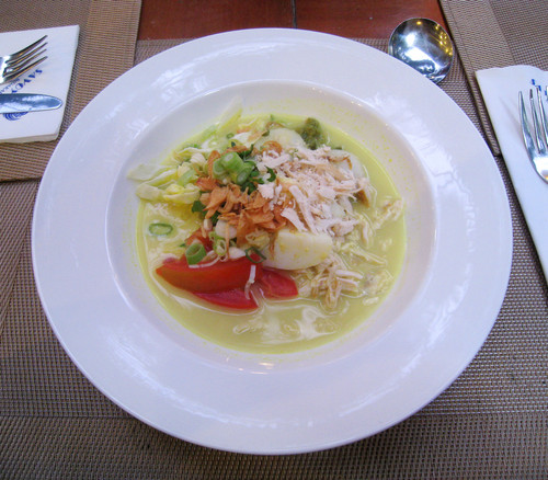 Soto Ayam (chicken soto) a breakfast dish in Savoy Homann Hotel, Bandung. Chicken in spicy yellow tu.jpg