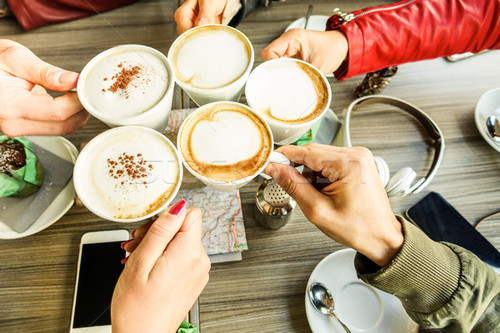 8556230 stock photo friends group toasting cappuccino and milk with cocoa close up.jpg