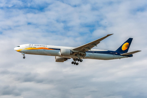VT-JES Jet Airways Boeing 777 Landing in London Heathrow International Airport. England..jpg