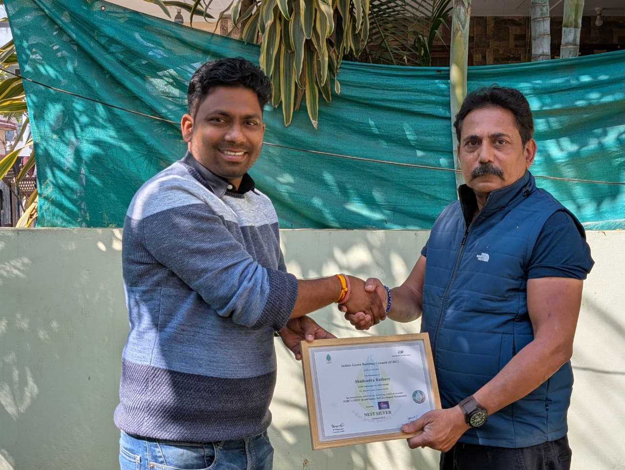 Dr. Rathore in group photo at academic event