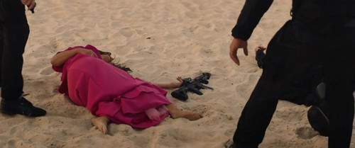 High Rollers Gina Gershon stun gun 1.jpg