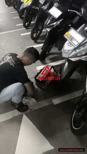 montir motor servis di apartemen.jpg