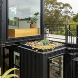 Vertical Pintereststyle image of container home with viral design tips Centered overlay text reads V