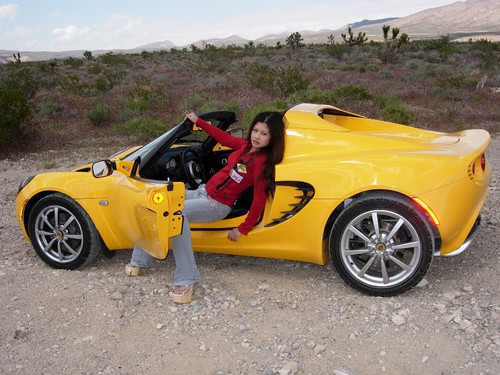 girl reclining in seat of lotus.jpg