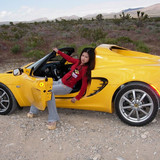 girl reclining in seat of lotus