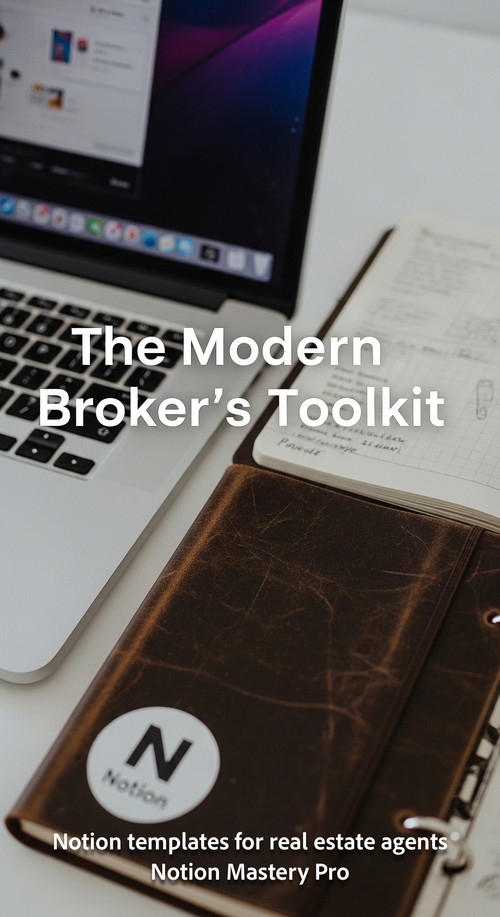 Close up of a sleek silver laptop and a leatherbound notebook with a Notion N sticker Overlay The Mo.jpg