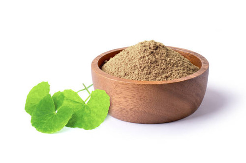 Dried gotu kola leaf powder (Asiatica centella) in wooden bowl and fresh green leaves isolated on wh.jpg