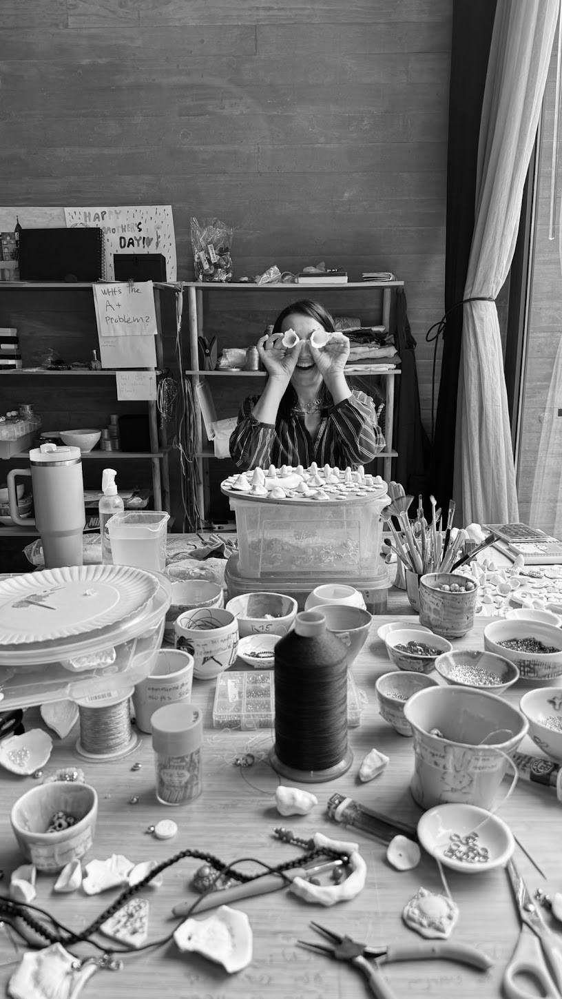 Playing with porcelain pieces in the studio