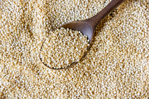 top view quinoa with a wooden spoon.jpg