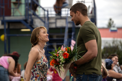 (from left) Kenna Rowan (Maika Monroe) and Ledger Ward (Tyriq Withers) in REMINDERS OF HIM, directed.jpg