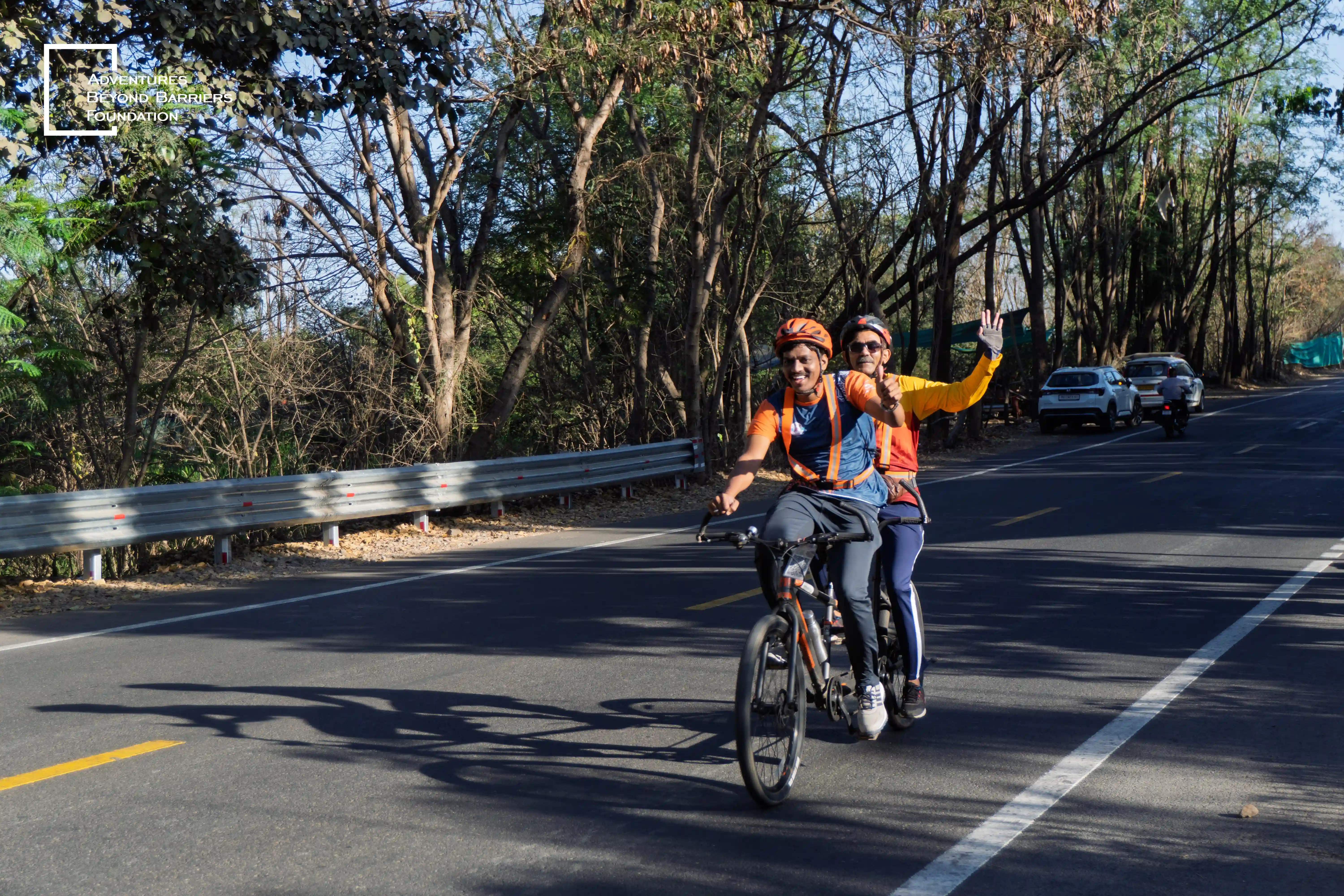 ABBF inclusive tandem cycling — sighted cyclist and visually impaired co-pilot