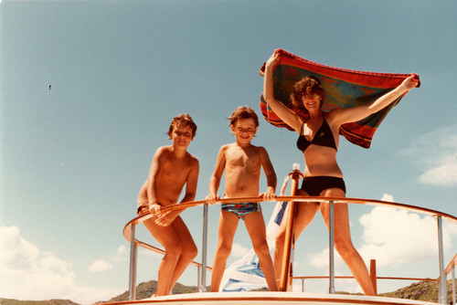 Mum on boat hong kong with Jem and Elliot.jpg