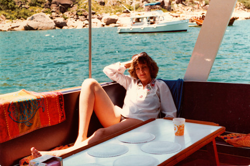 Mum on boat lounging.jpg