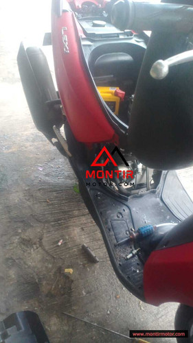 montir motor yamaha lexi