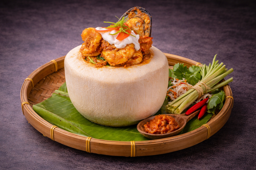 34 SEAFOOD STEAMED IN COCONUT.png