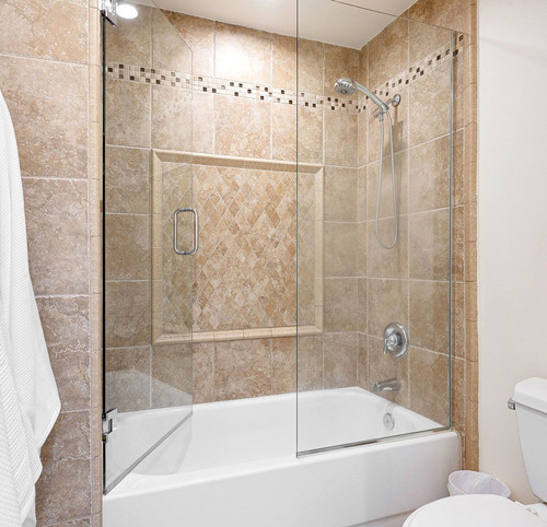 Modern bathroom with beige tile walls GettyImages 2160787772 FT.jpg