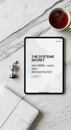 119 Flat lay of an iPad showing a Success Stories page a silver trophy charm a white leather agenda .jpg