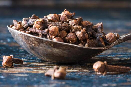 whole cloves spice on a vintage spoon photo.jpg