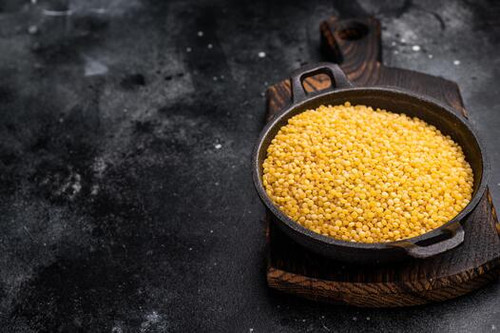 ptitim pasta israeli couscous in a skillet black background top view photo.jpg