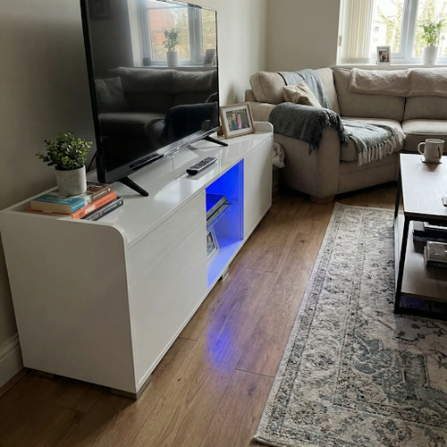 A White High Gloss TV Unit That Makes the Room Feel Bigger.png
